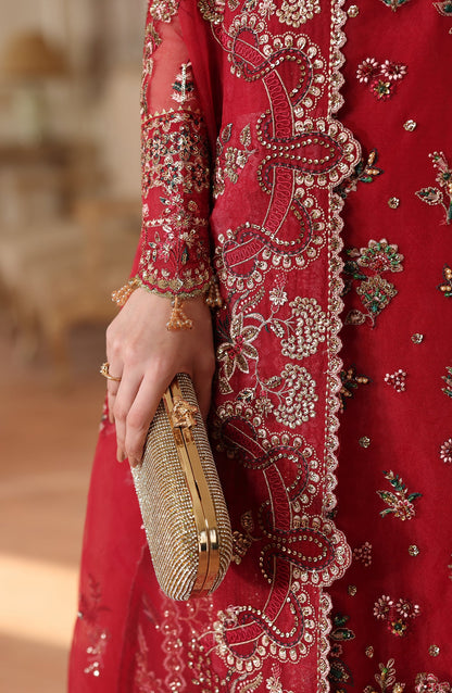 Model wearing Surkh Gul luxury women festive dress